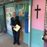 Sister of Mercy Betty Campbell of Casa Tabor in Ciudad Juárez, explains hand-written murals depicting victims of violent deaths in Latin America